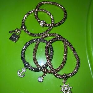 Elegant Gold and Silver Charm Bracelets